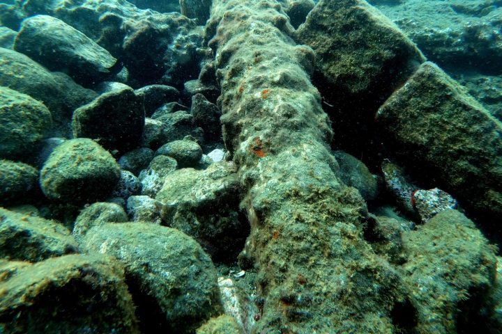 underwater view of a large rock