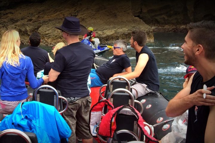 a group of people sitting on a bench