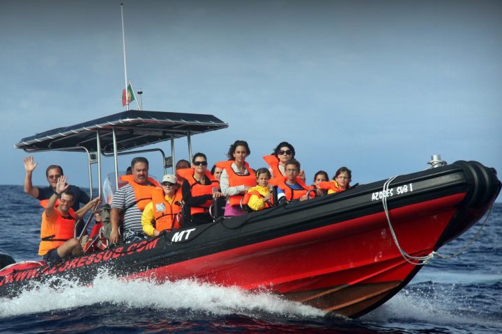 a small boat in a large body of water